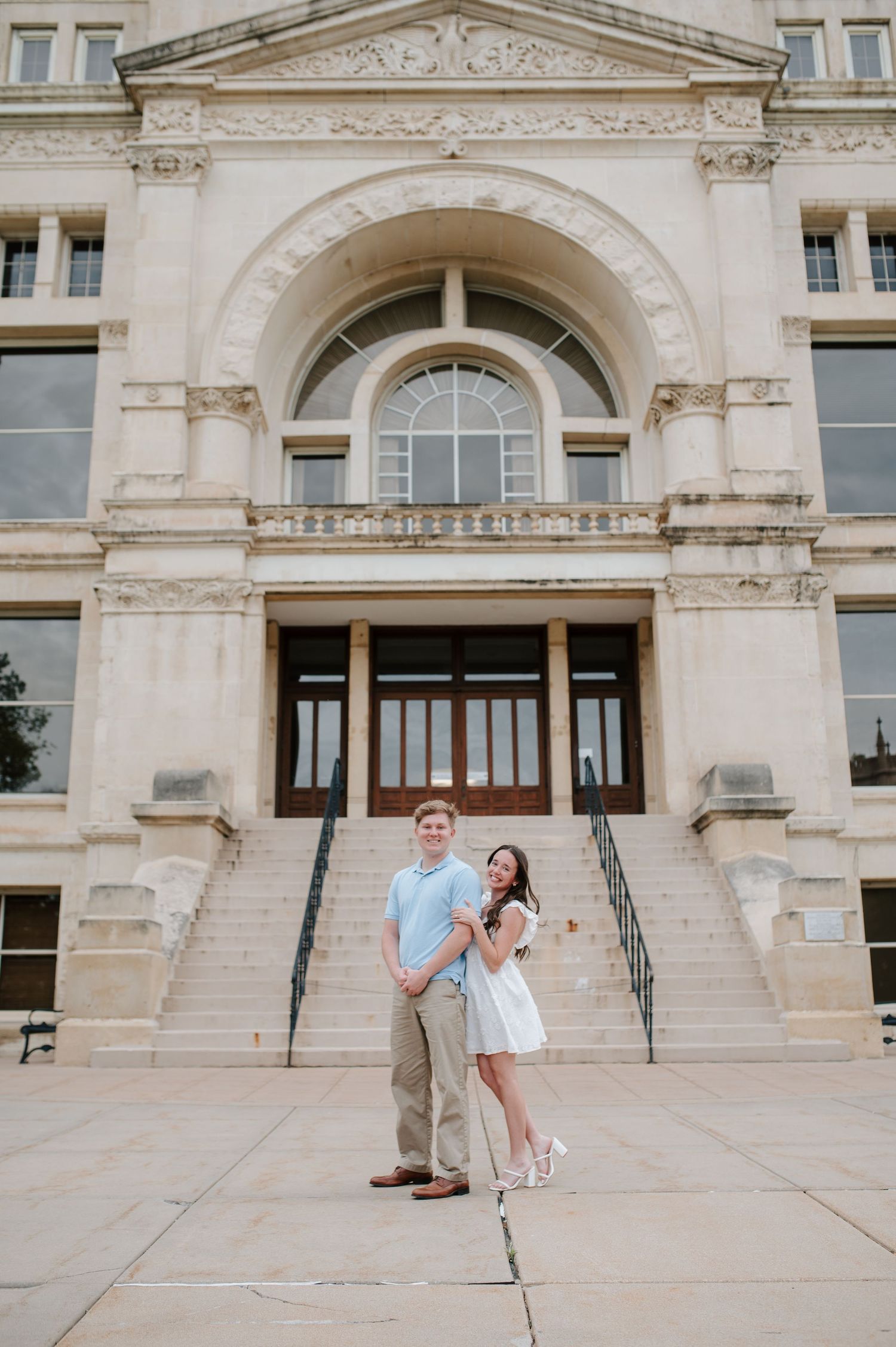 Downtown Wichita KS engagement session by photographer Jessica Nadine Photography.  Classic architecture buildings city courthouse elopement