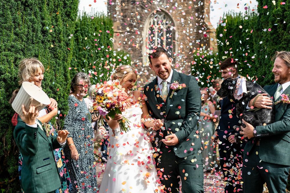 Epic confetti shot by Devon Wedding photographer in Stoodleigh Tiverton