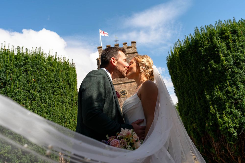 Realxed Devon Wedding photography at Stoodleigh Church with married couple