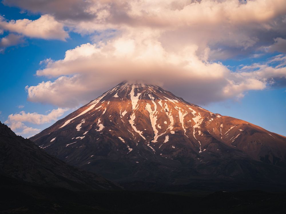 Mount Damavand rising above Dashte Lar plain, Iran.
