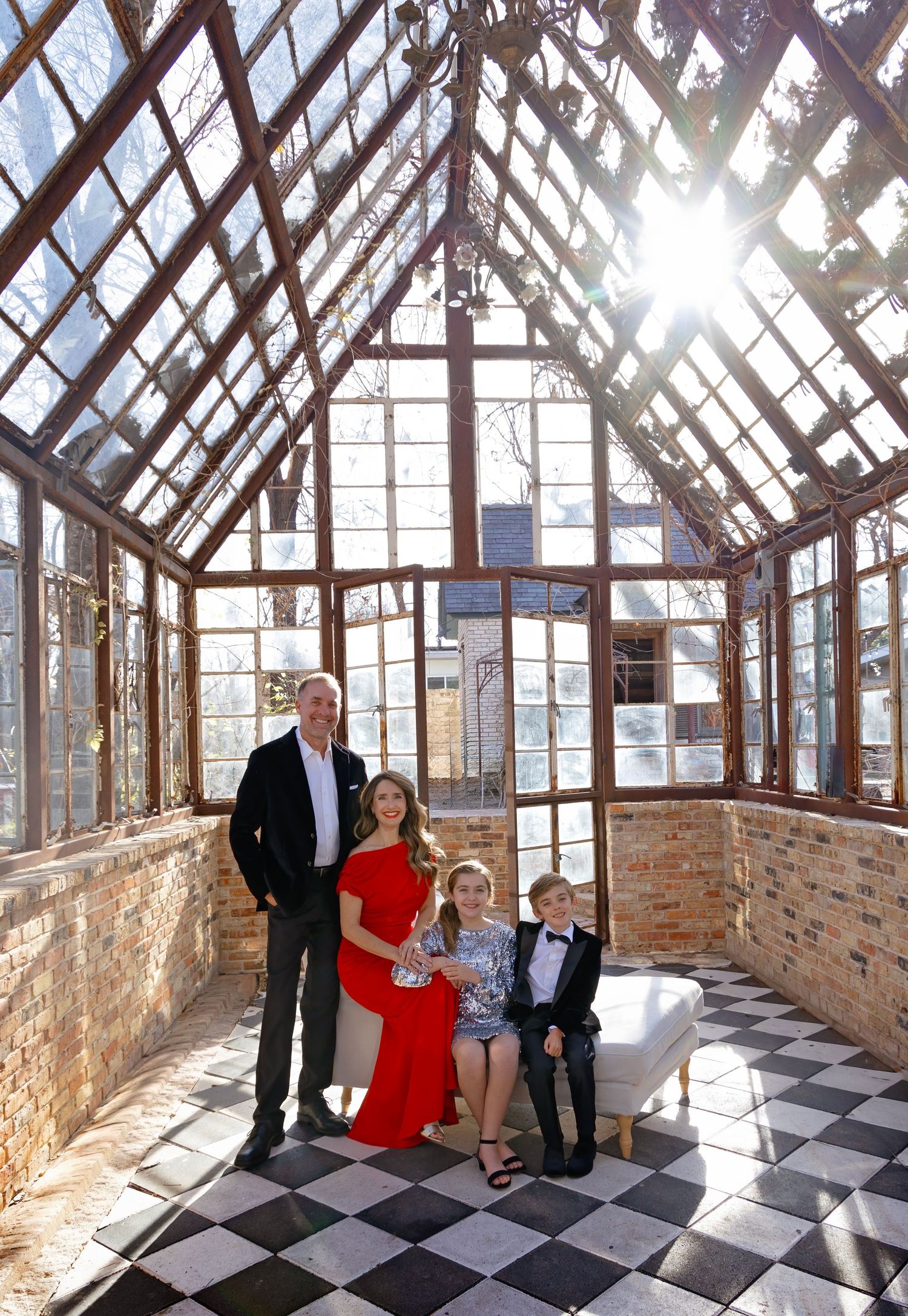 A sunlit conservatory with checkered floor tiles shows a sequence of family photos taken in the same elegant space.