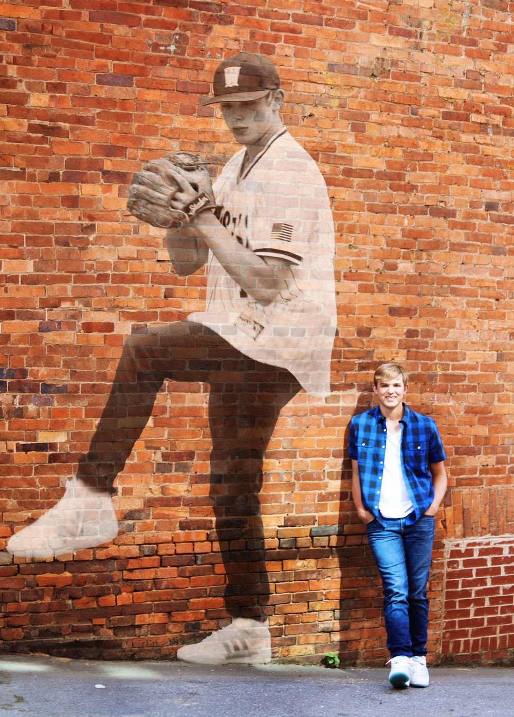 Baseball mural on brick wall with vintage player pitching motion.
