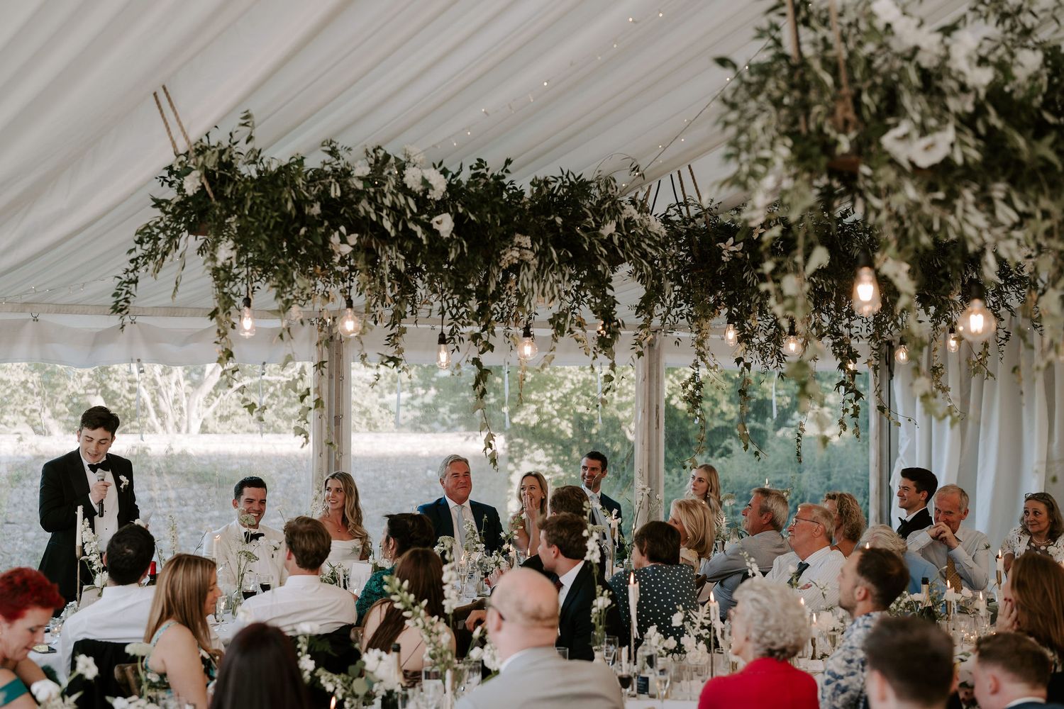 best man giving speech to wedding guests at hamswell house wedding in bath