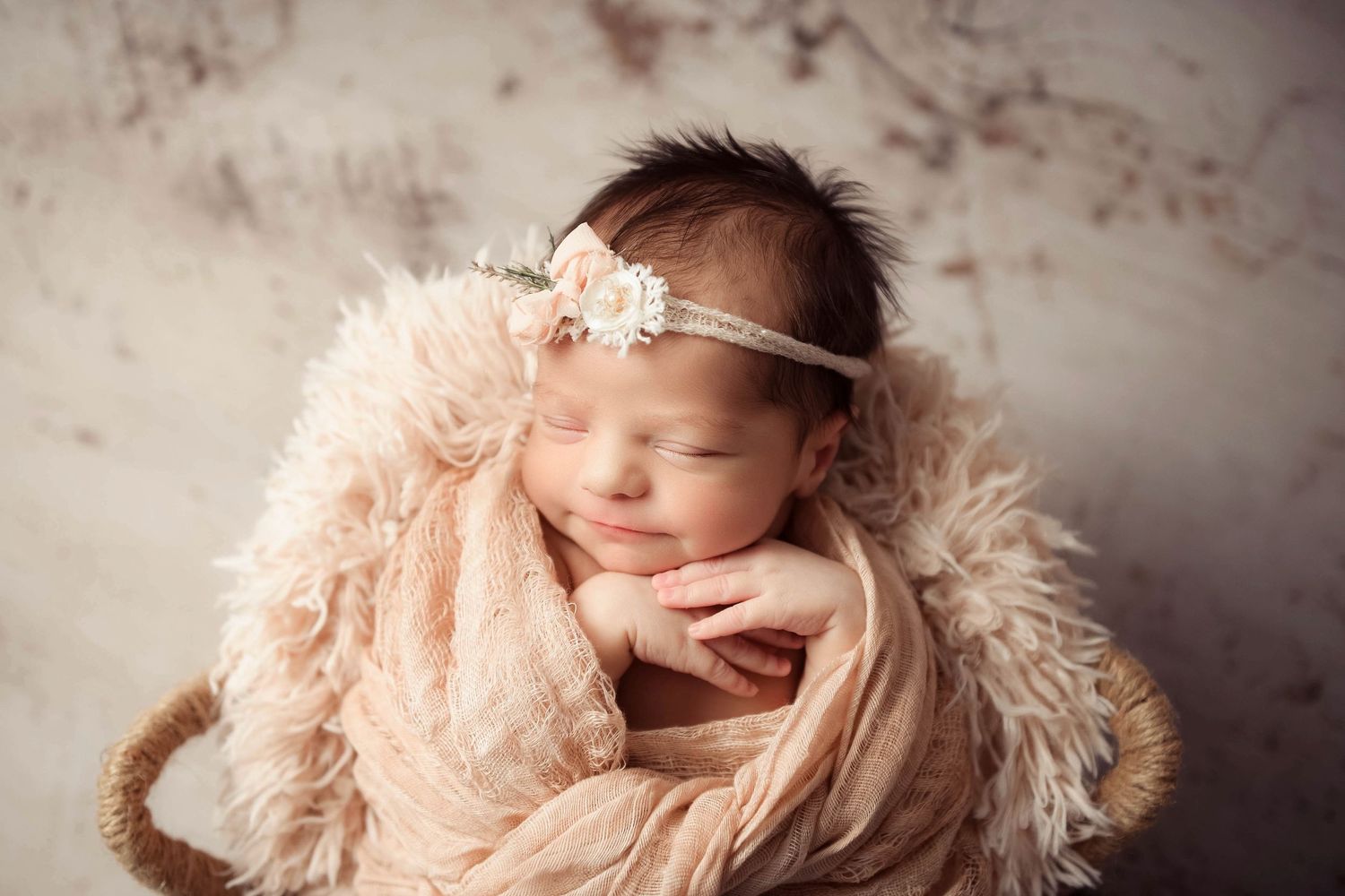 newborn with teddy bear