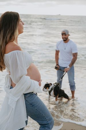 Maternity session on the beach in La Jolla with dog