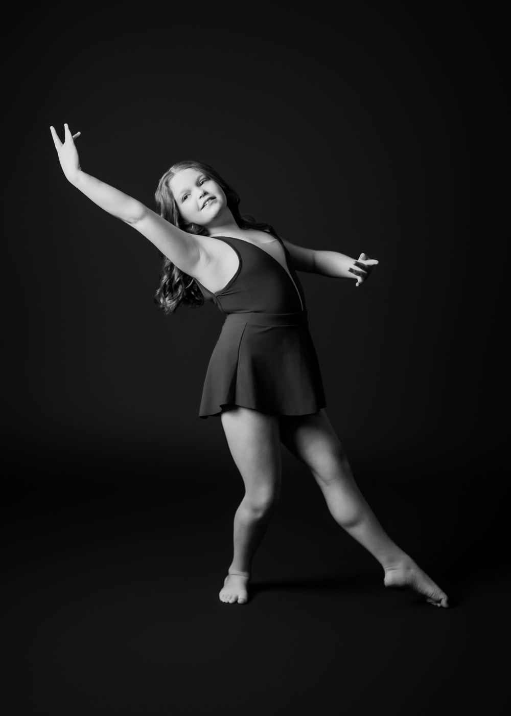 Photographer Janesville Wisconsin. Contemporary. Dance. Studio Photography. Artistic. Action shots. Movement Photography.