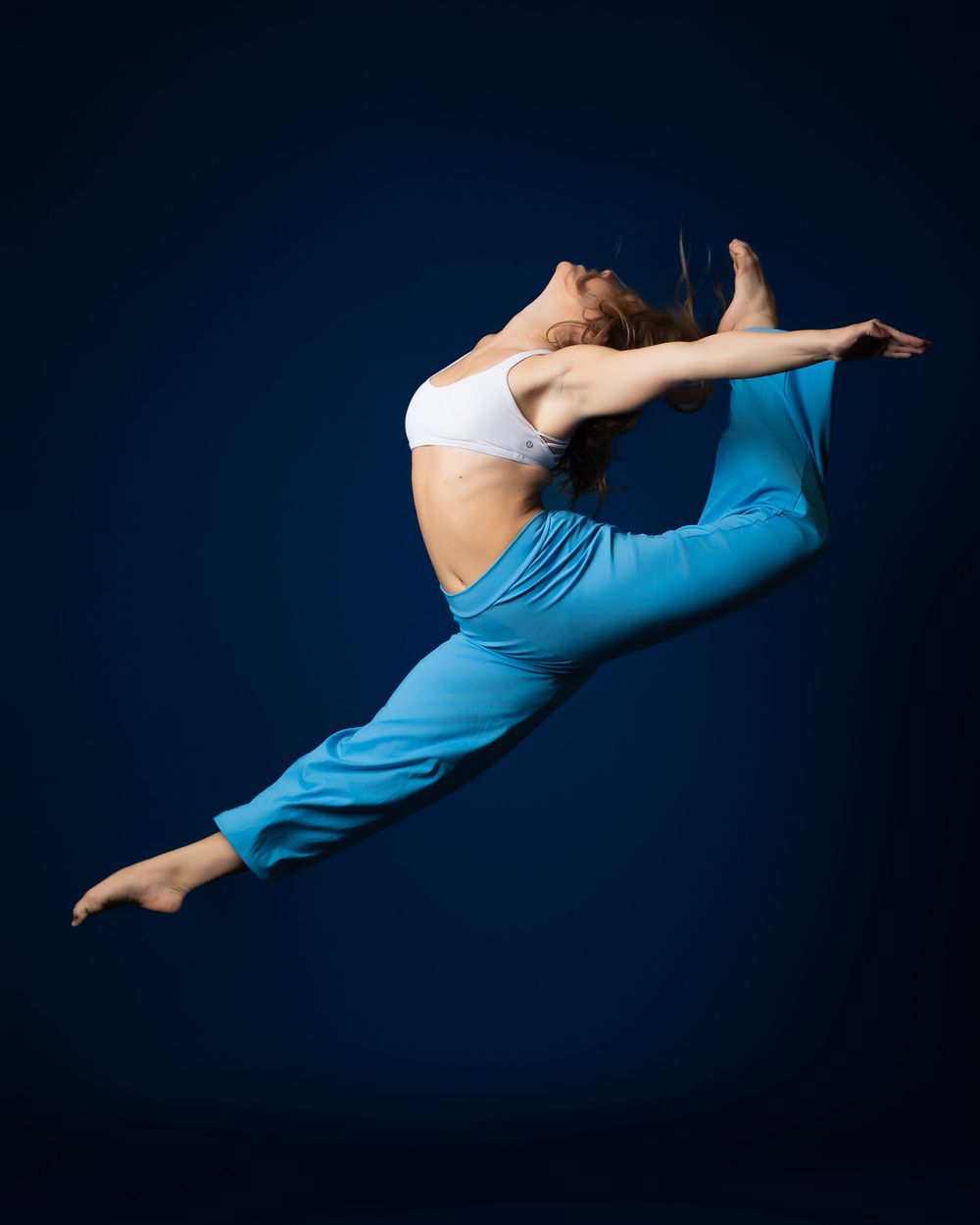 Photographer Janesville Wisconsin. Contemporary. Dance. Studio Photography. Artistic. Action shots. Movement Photography.