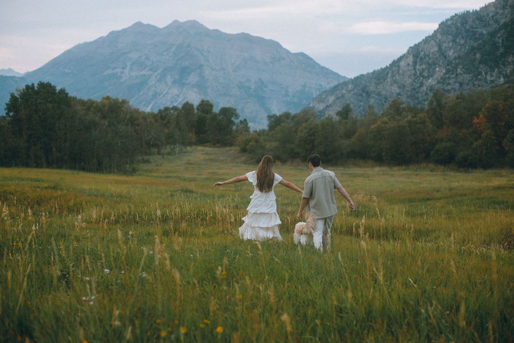 Fall engagement session with couple and their dog at Buffalo Peak in Provo Canyon, captured by Utah cinematic photographer Julia Fay Photo.