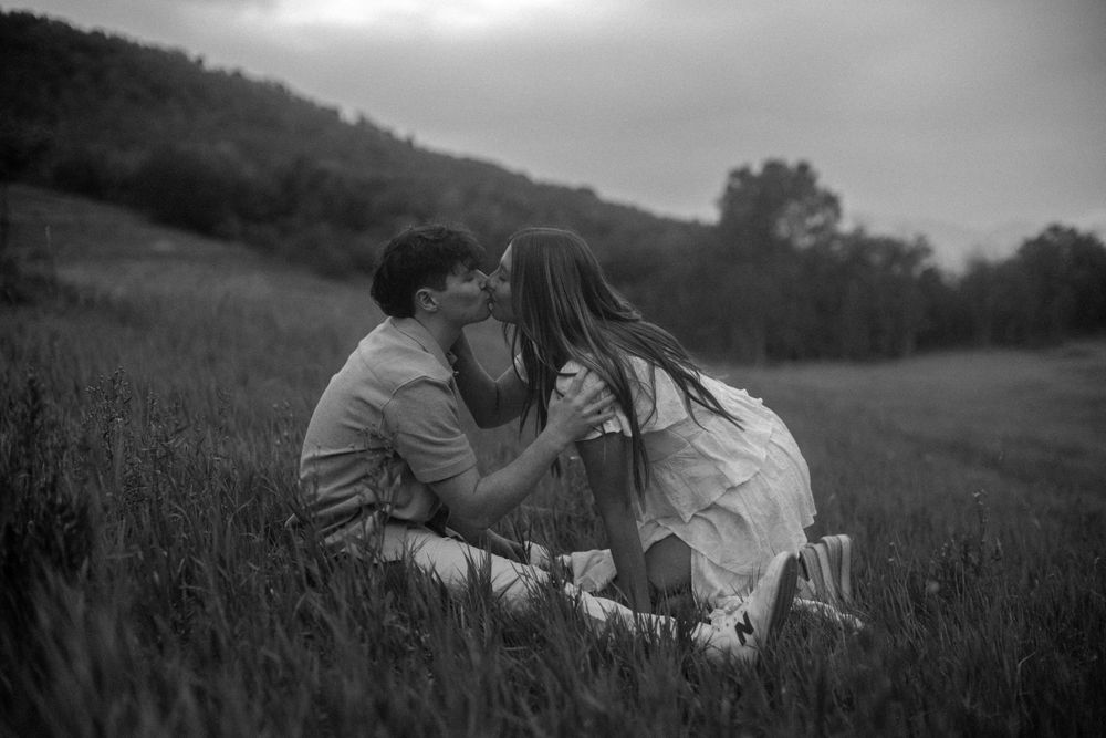 Fall engagement session with couple and their dog at Buffalo Peak in Provo Canyon, captured by Utah cinematic photographer Julia Fay Photo.