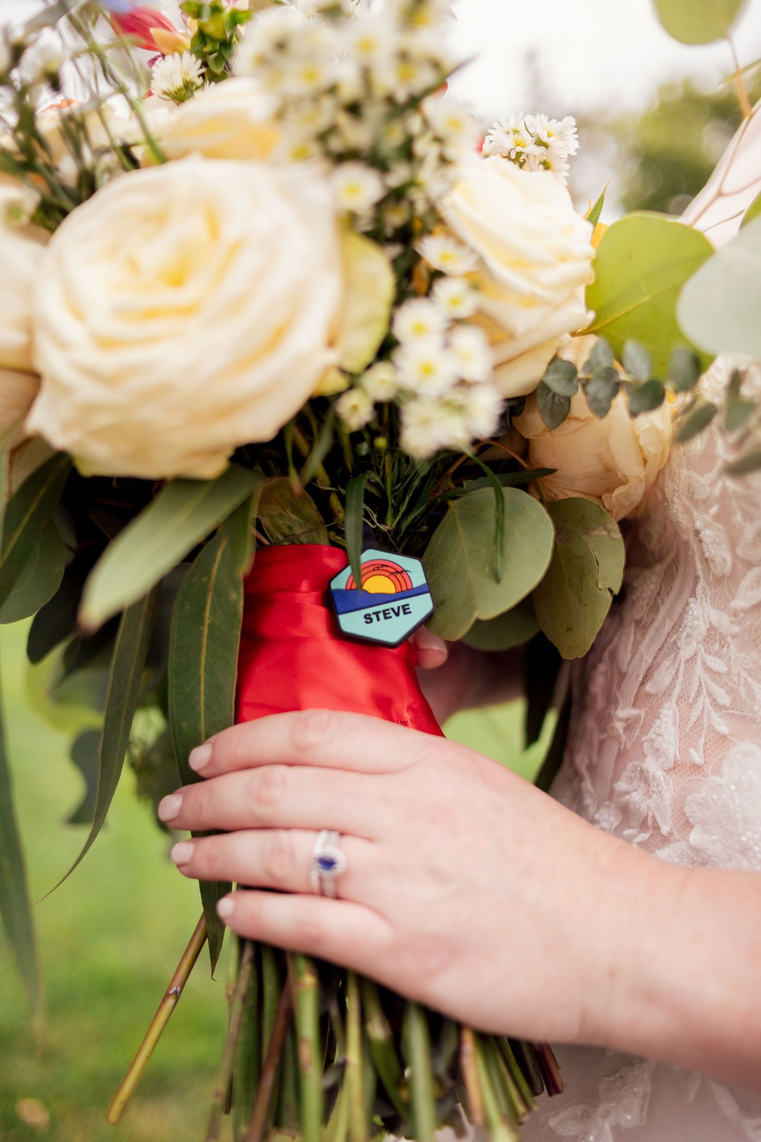 sentimental bouquet detail honoring couple's dog who passed away
