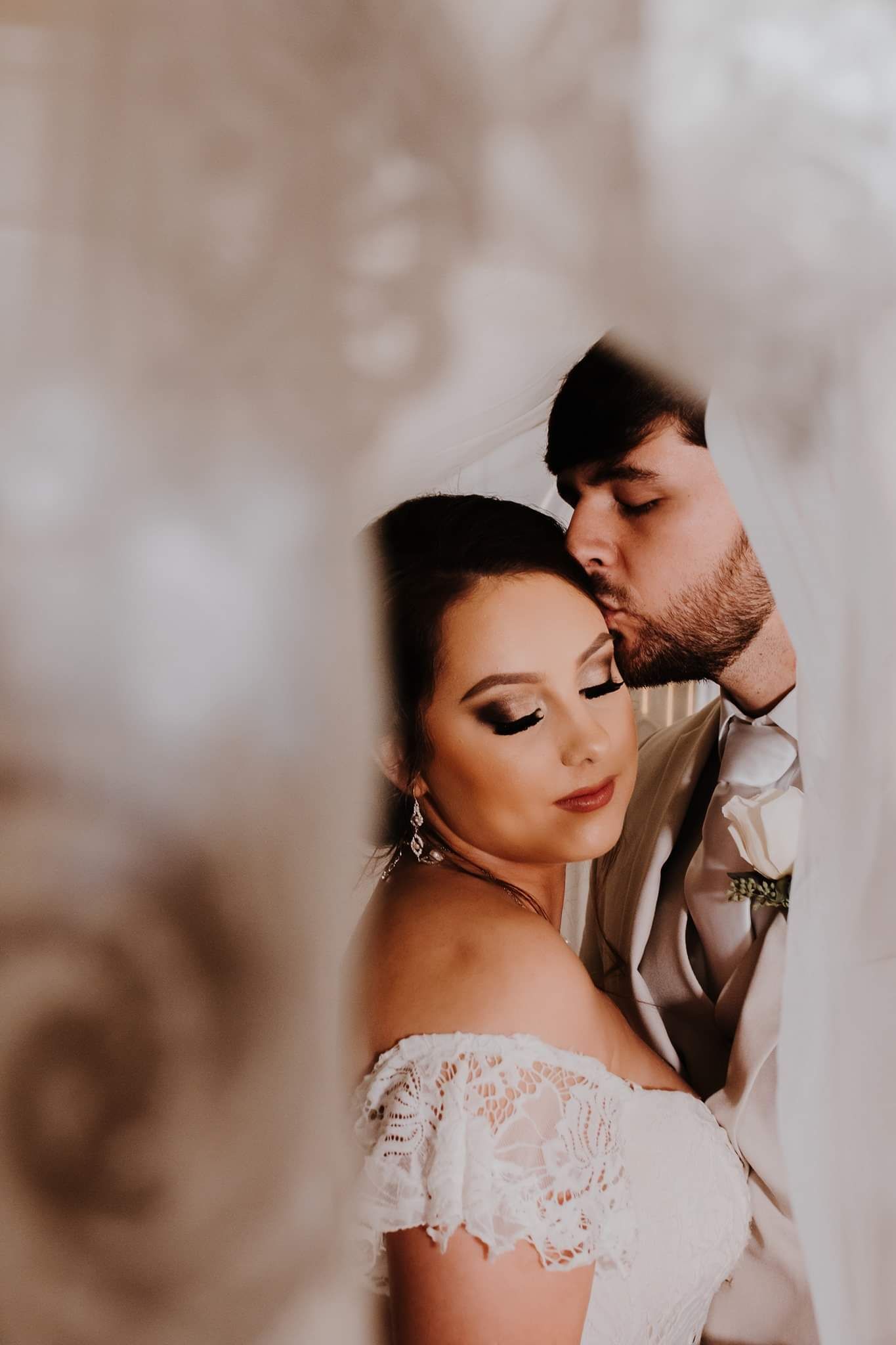Romantic wedding couple shares intimate moments in soft sepia-toned photo collage.