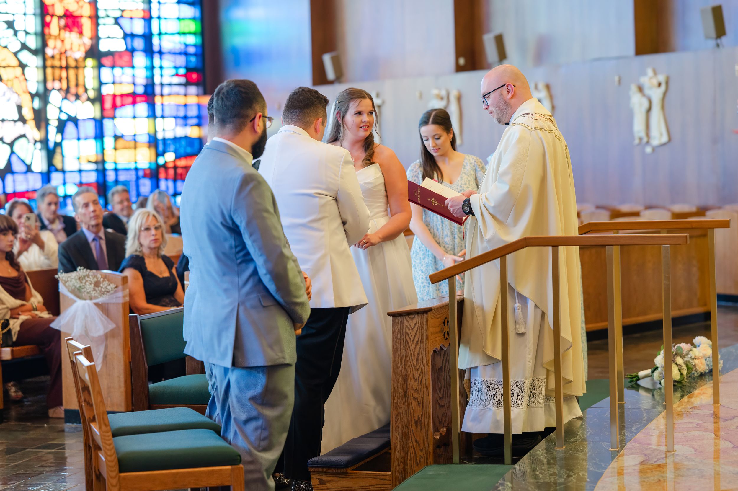 A wedding taking place at St. James the Apostle in Carmel, NY shot by Westchester wedding photographer.