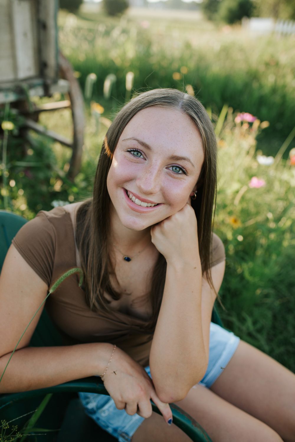 A series of casual outdoor portrait shots in a natural setting with wildflowers and grass in the background.