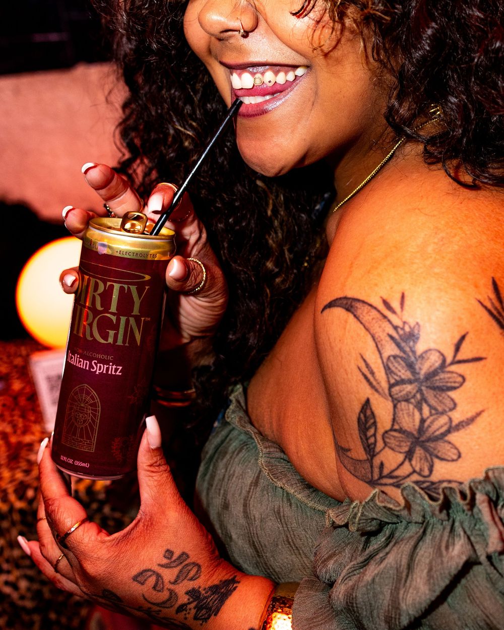 New York City brand activation event attendee poses with product photographed by event photographer Kade Joy.