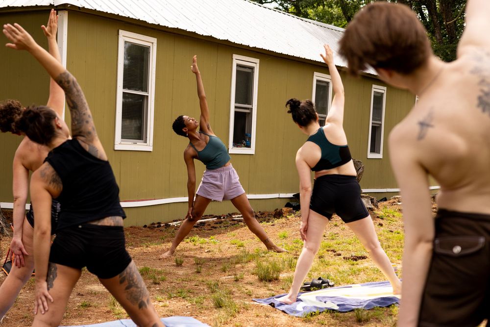 Queer yoga photography by lesbian artist Kade Joy.