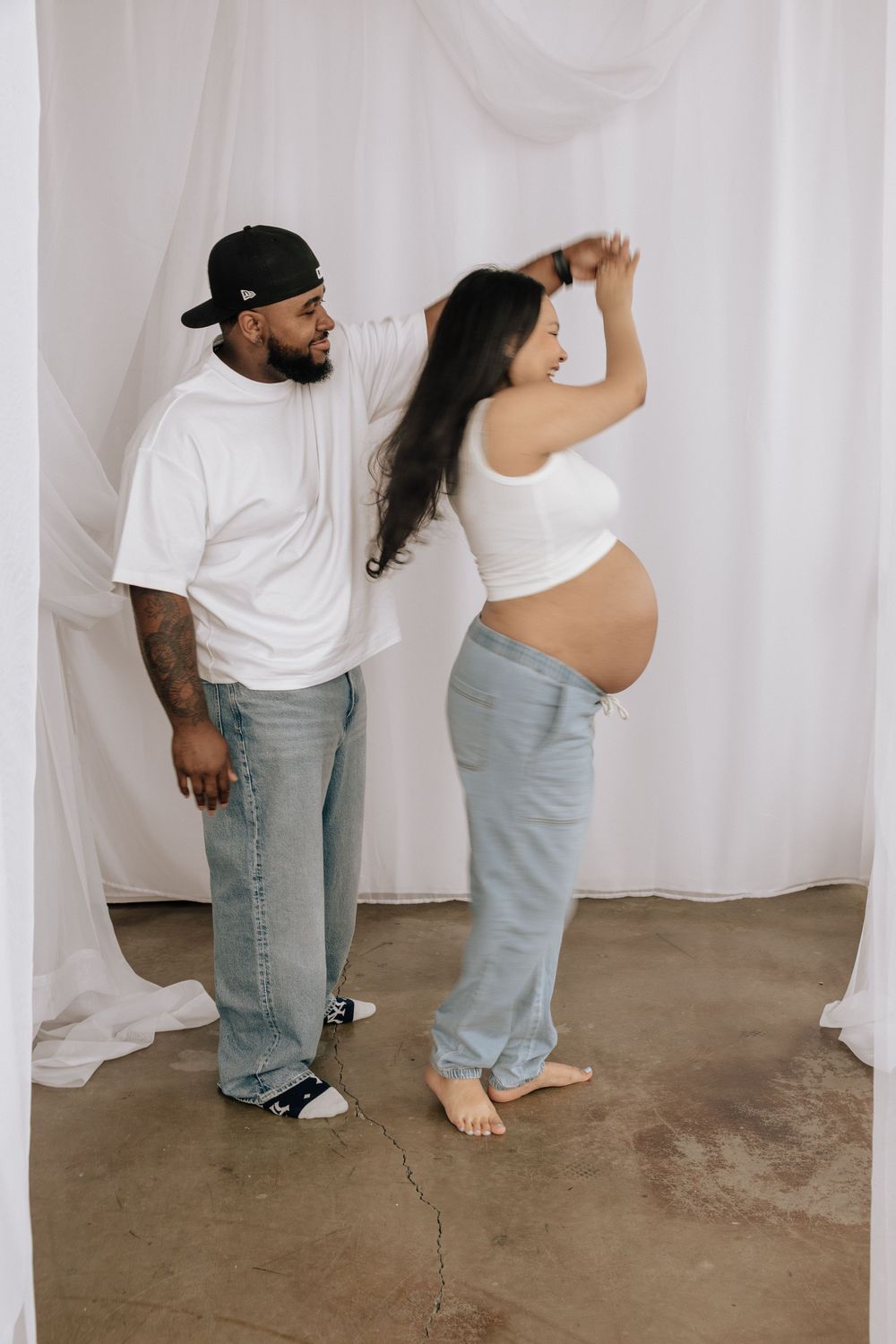 Movement-based maternity photography in Rochester NY studio