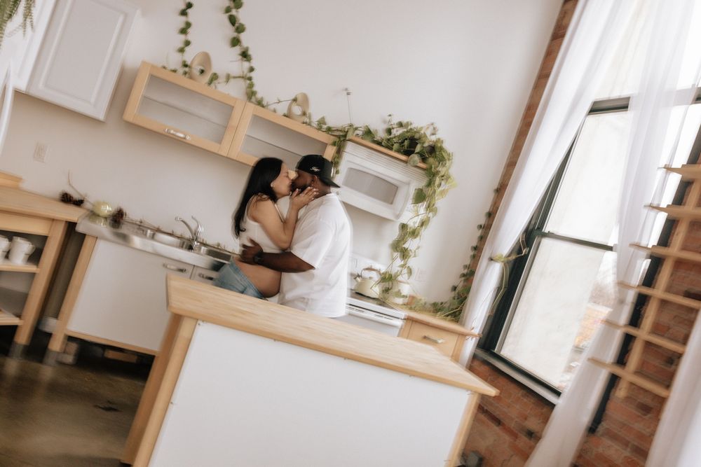 Bloomroc Rochester maternity photographer capturing cozy studio session