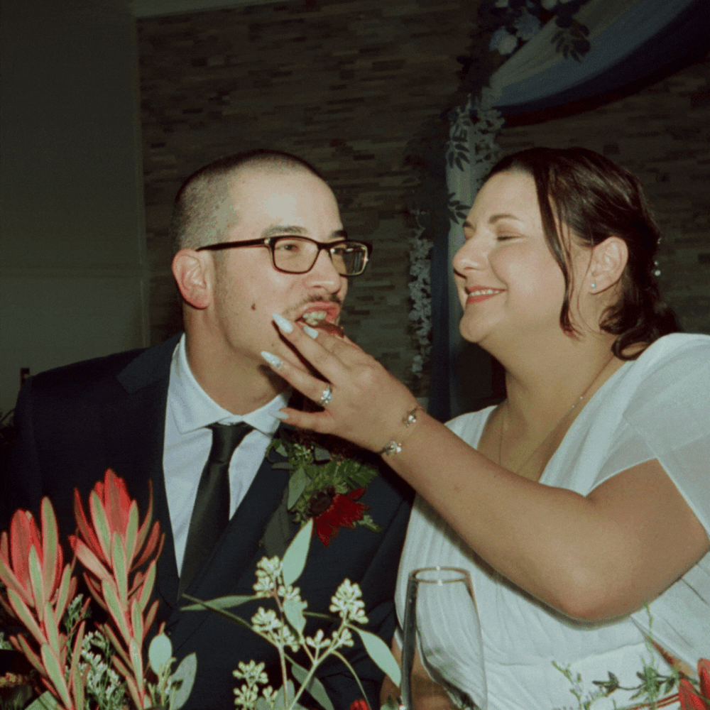A couple shares intimate moments during their wedding celebration, exchanging playful and loving gestures.
