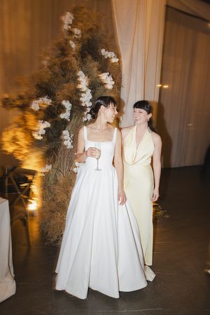 Dancefloor moments with bride and wedding guest.