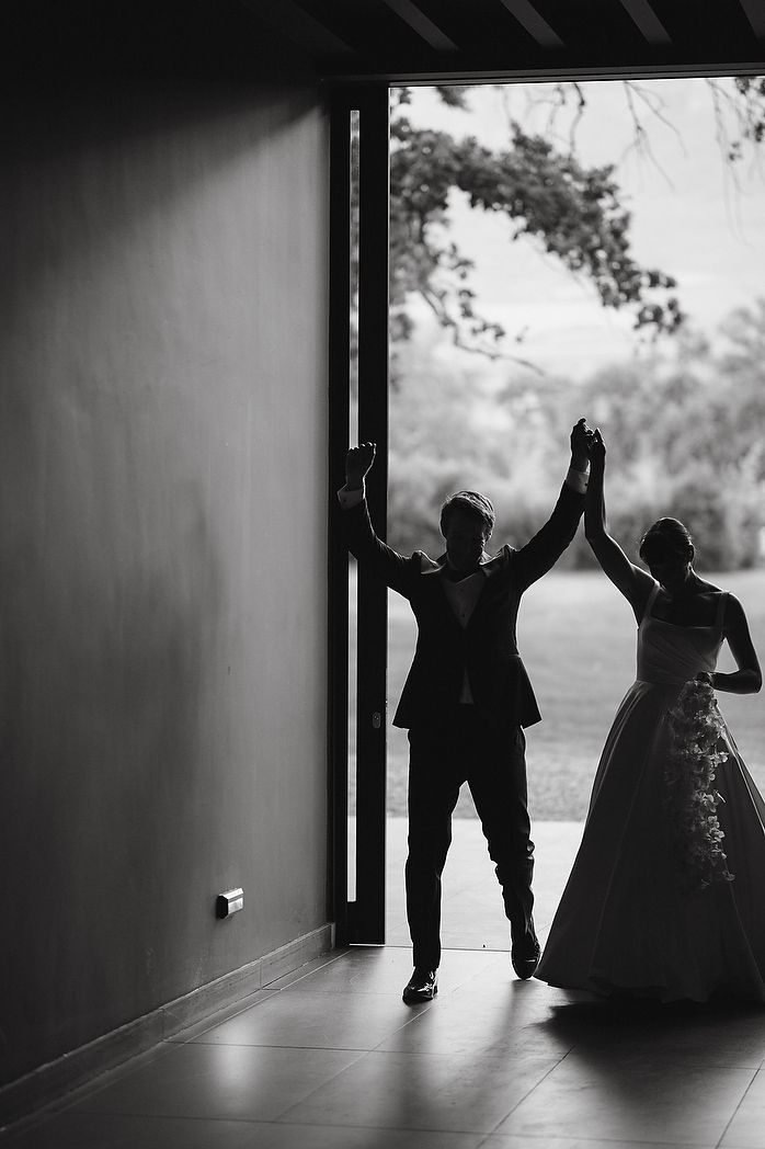 Bride and groom entering the reception venue.