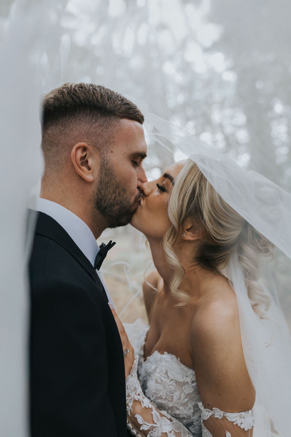 hobbit hill wedding photography bride groom veil