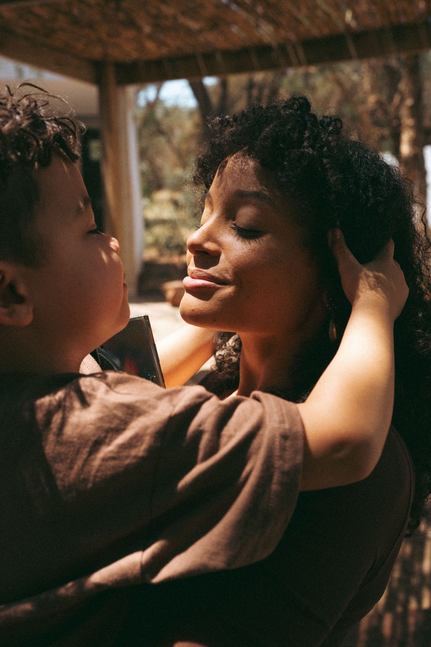 Artistic portrait series capturing intimate moments in warm lighting.