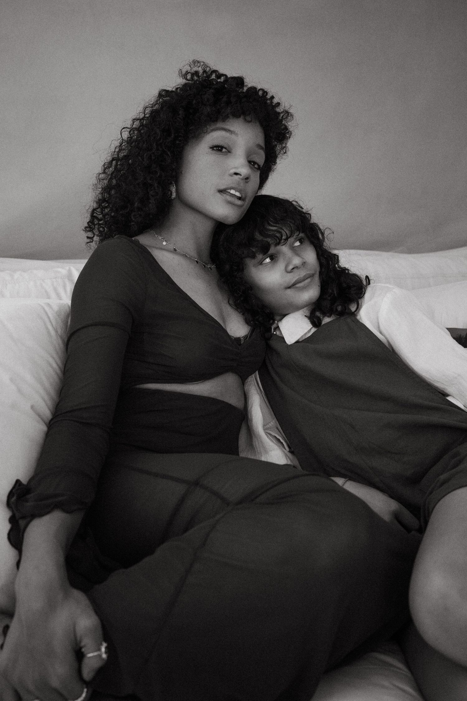 Black and white photos showing tender moments between two people resting.