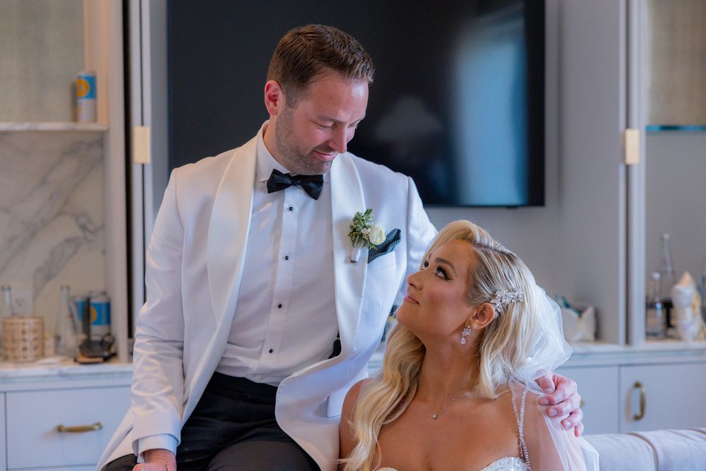 Bride and groom looking at each other