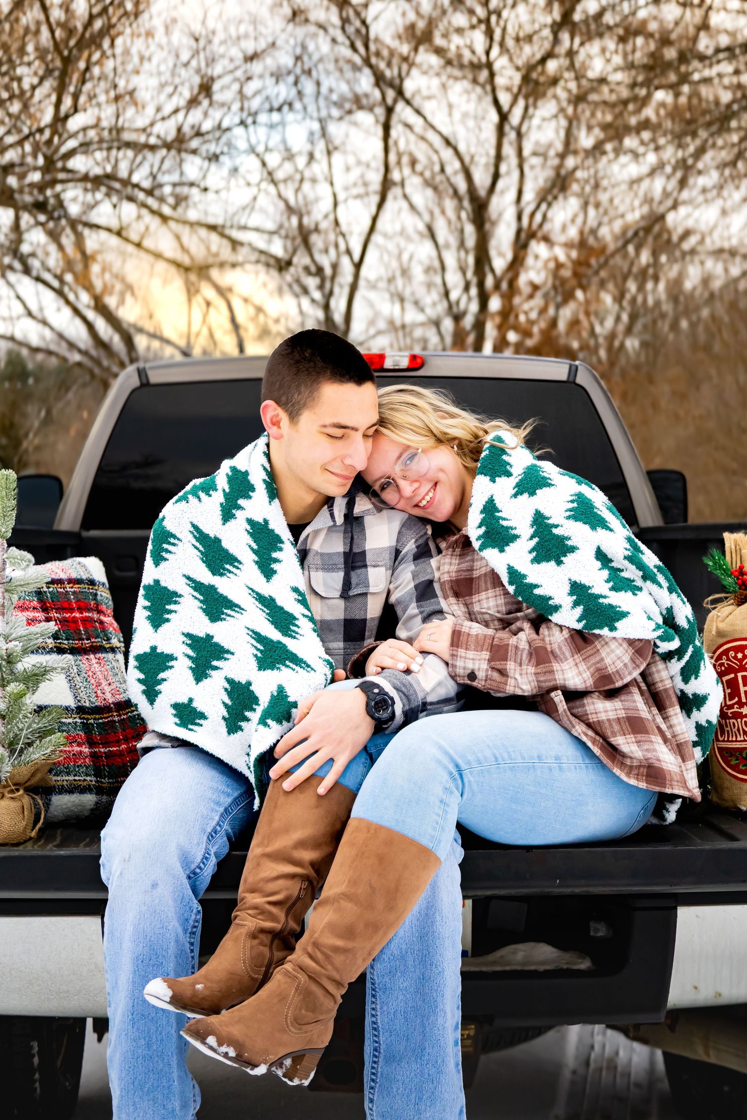 Candid outdoor couples portrait of a couple sitting together during a lifestyle photography session in Michigan