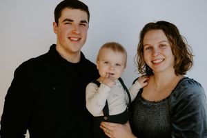 Family portrait series showing loving interactions in black and white.