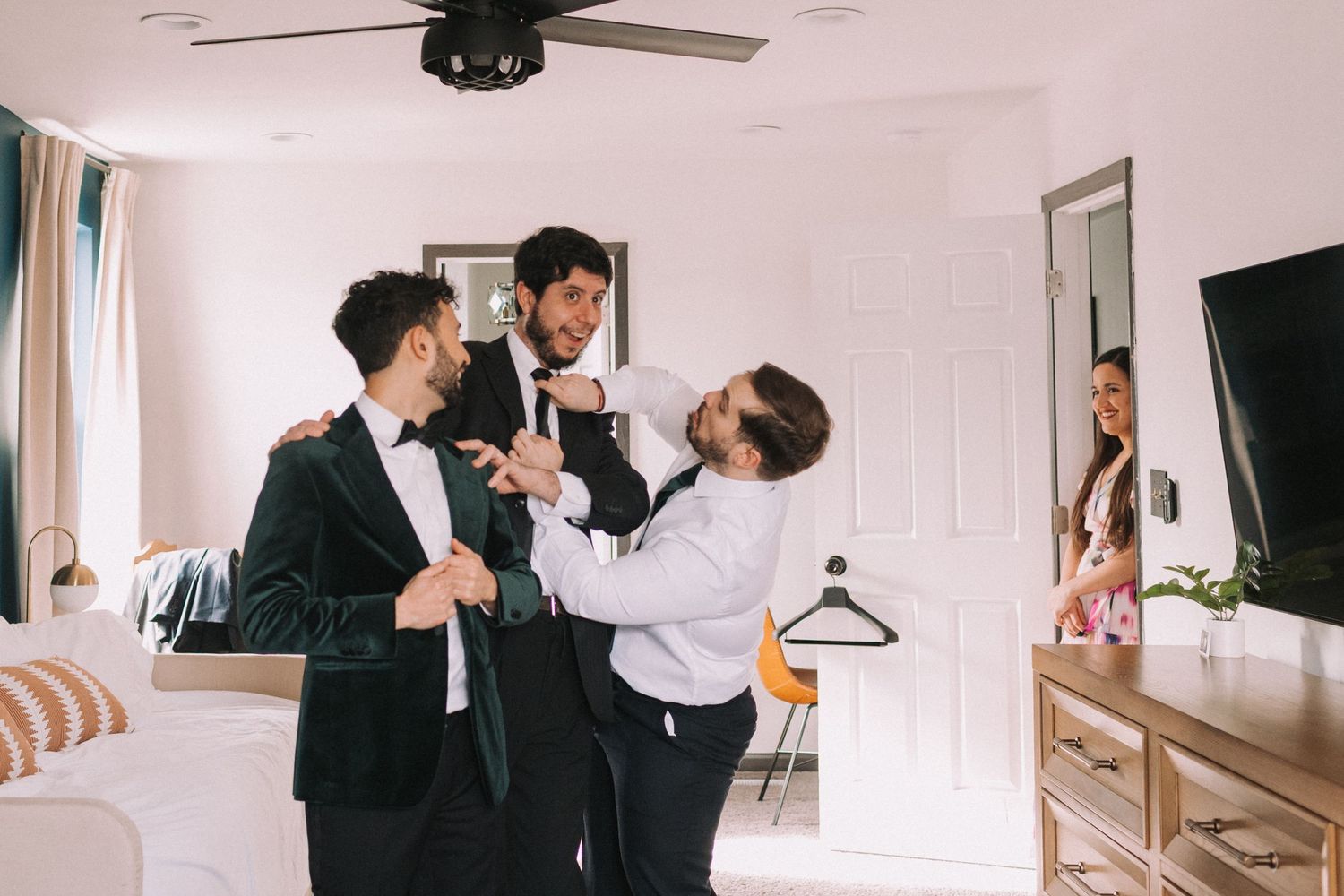 A series of wedding photos arranged in a horizontal collage showing intimate moments and preparations.
