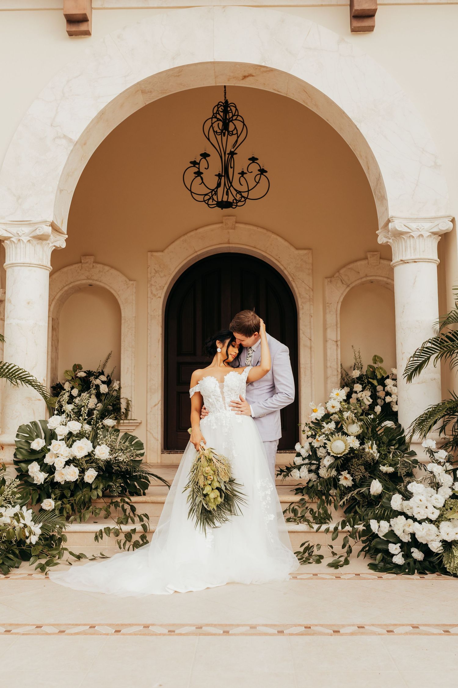 A romantic sunset silhouette against cypress trees in Tuscany with Honeybee Retreats Italy 2026 wedding branding.
