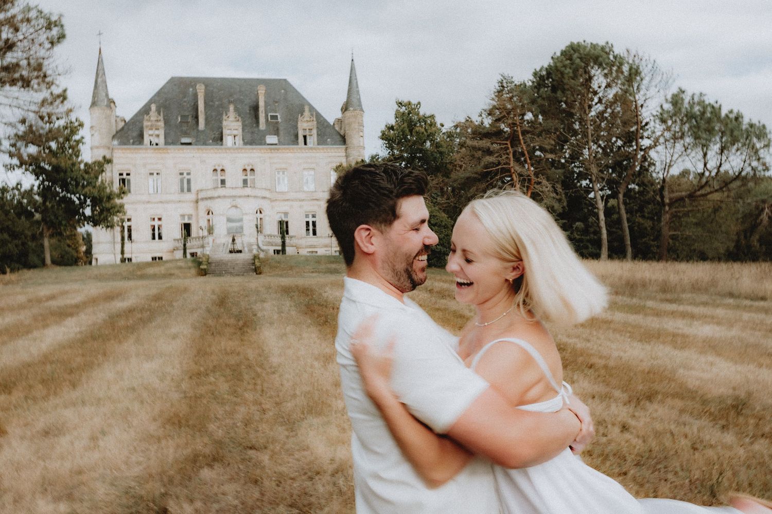 Documentary wedding photography in France showing a candid moment between a US couple during their destination wedding
