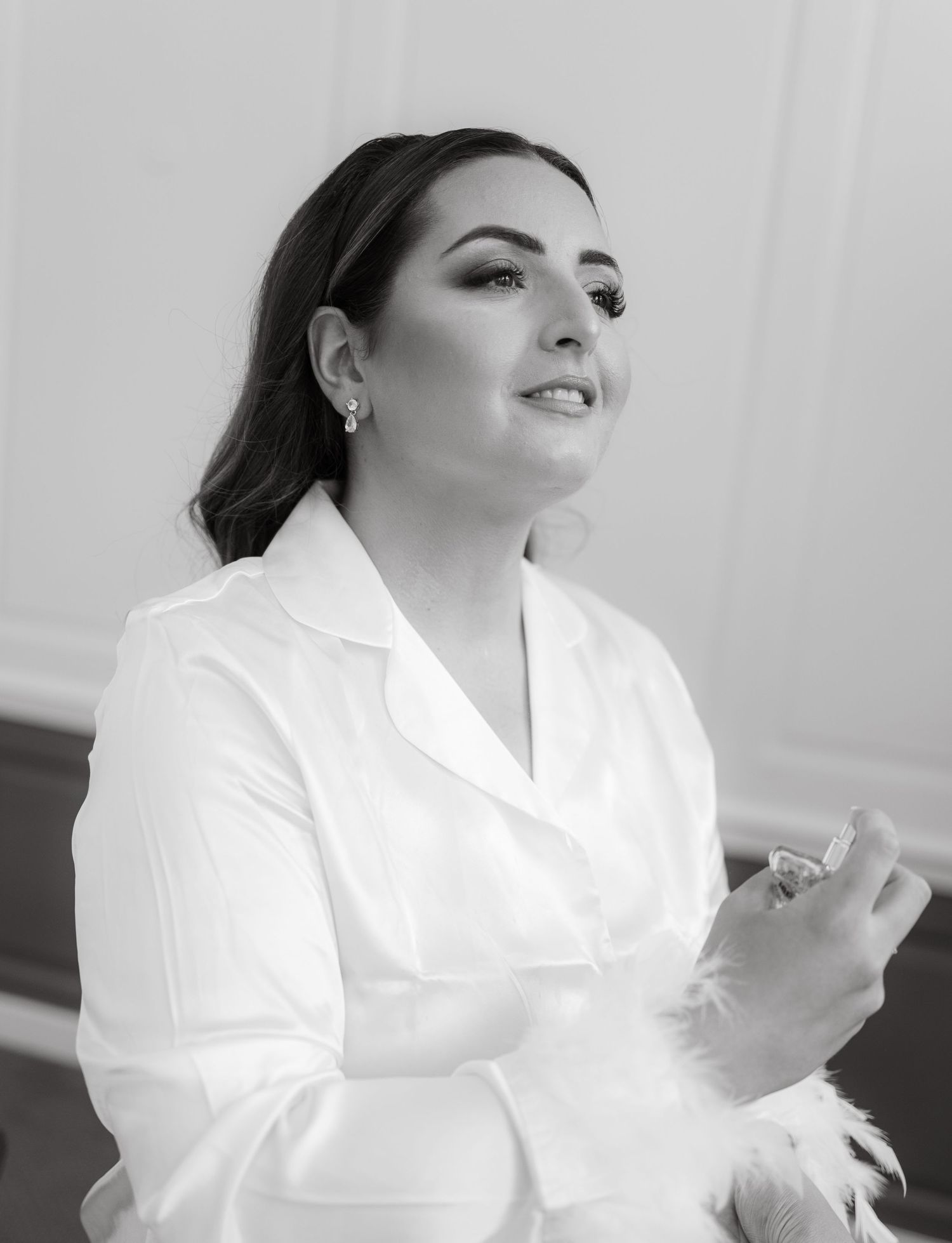 Person in white shirt gestures expressively in a sequence of black and white photos.