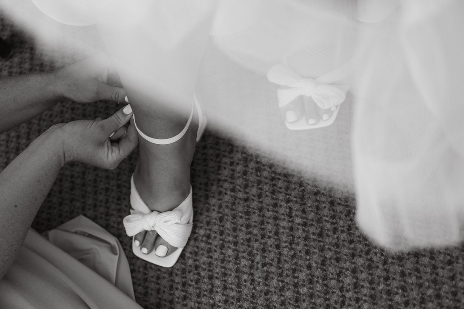 Sequence showing final wedding dress adjustments and preparations.