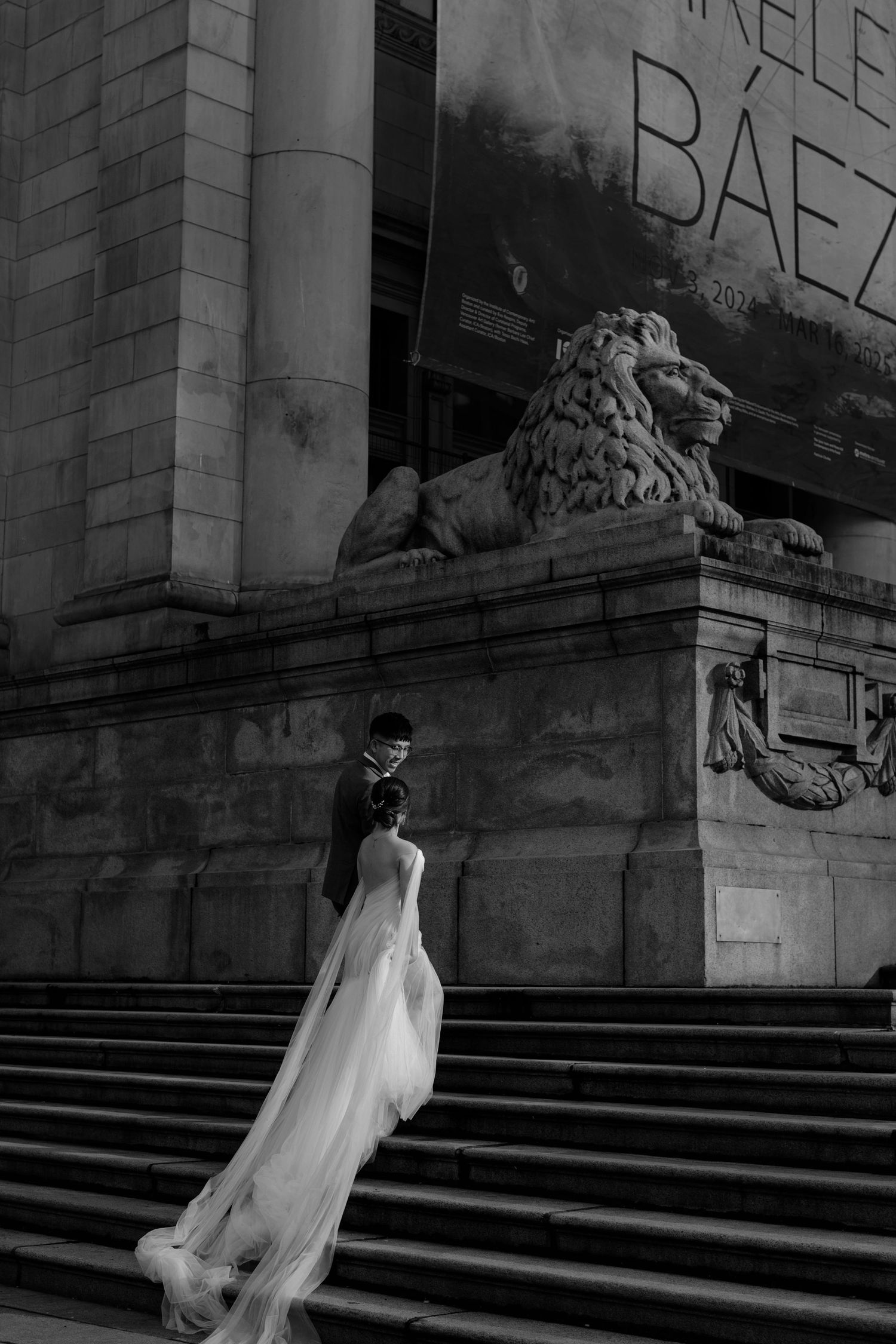 A series of artistic black and white photos showing movement on stone steps with flowing fabric.