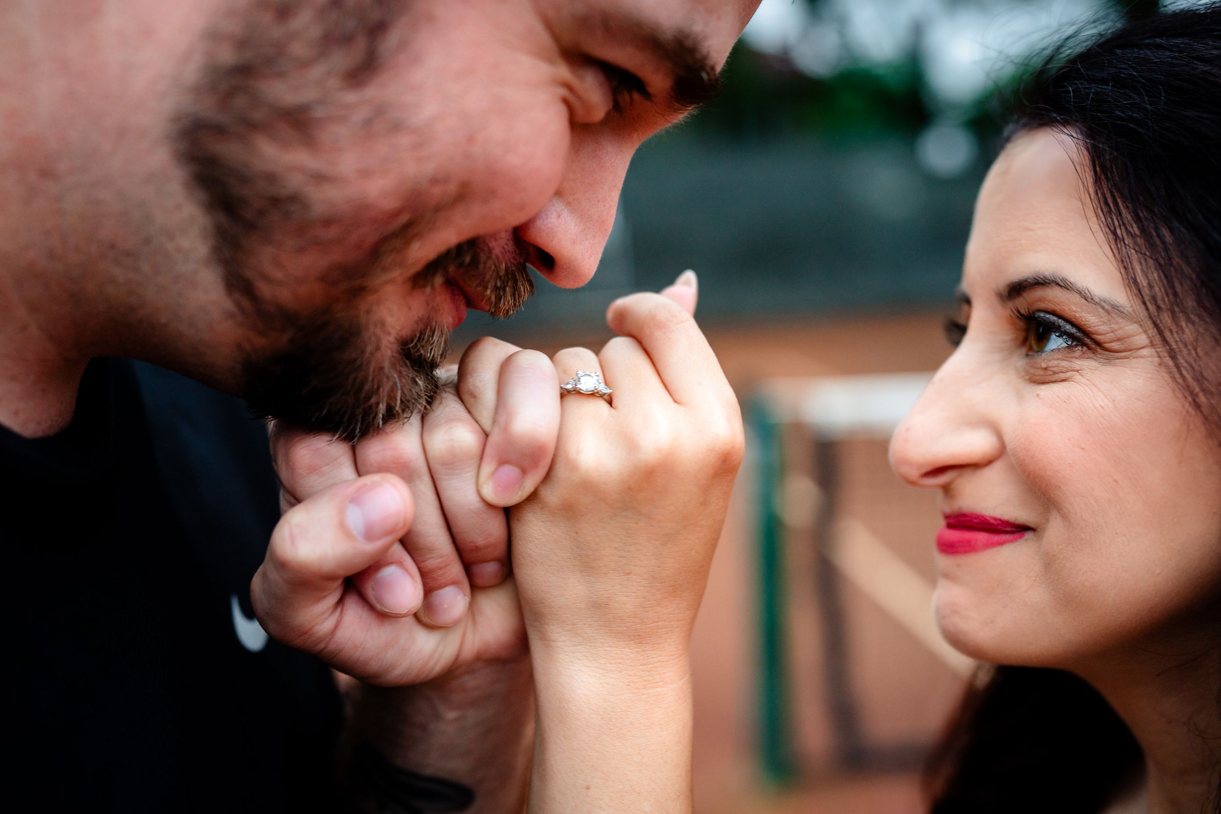 An intimate close-up moment captured during an engagement photoshoot.