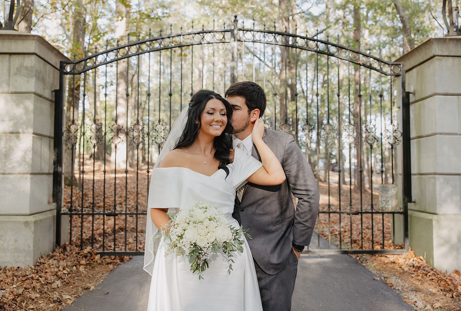 Elegant gated entrance for bride and groom portraits at Sanctuaire Atelier.