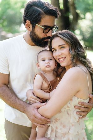 A tender family portrait series captured outdoors showing intimate moments of embrace and connection in natural lighting.