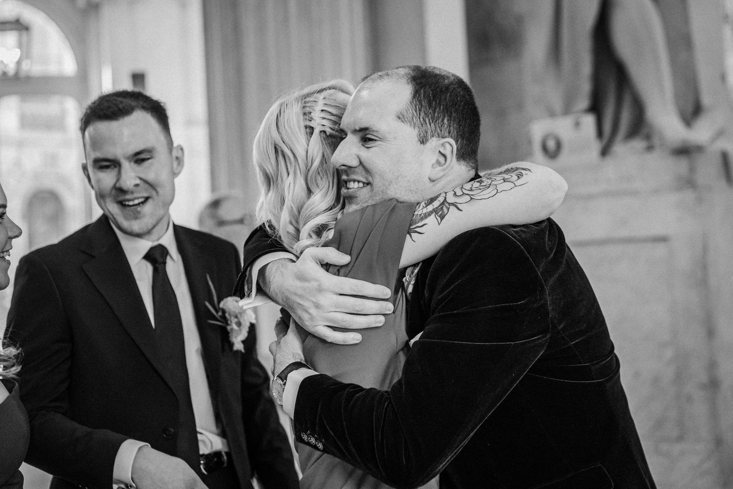 Series of candid moments captured during wedding celebration in elegant indoor venue.