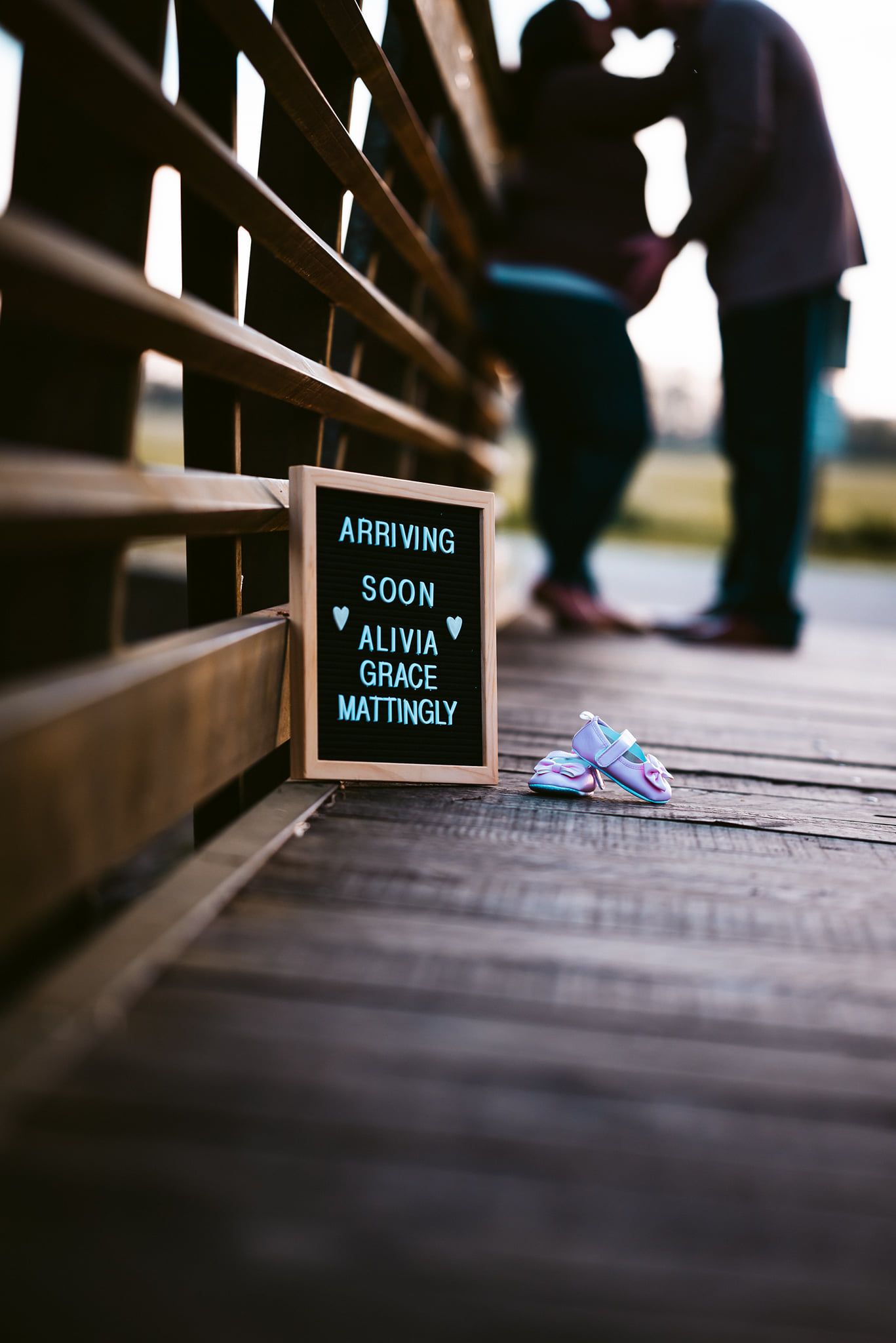 Small signs with text displayed on wooden steps in shallow focus.