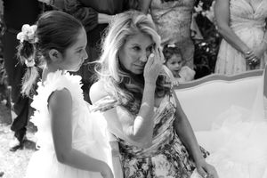 A black and white collage of wedding moments showing couples dancing, embracing and celebrating at their reception.