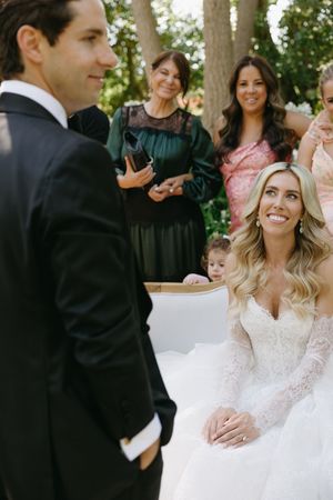 Joyful wedding celebration captured in a series of candid moments outdoors with elegant white dress and formal attire.