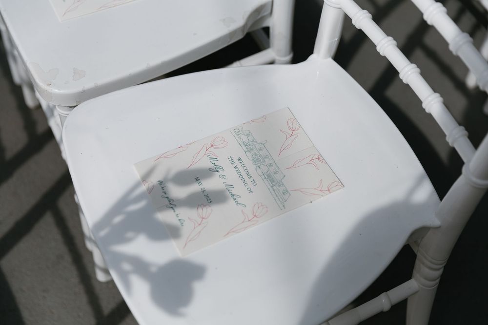 A collection of white paper sheets arranged in a row showing subtle shadows and folds.