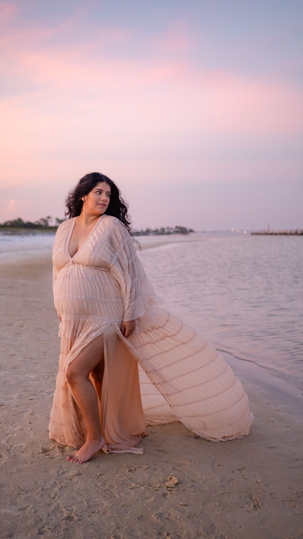 Panama City Beach photographer, family photos PCB, 30A maternity beach portrait with flowing dress captured during pink sunset.