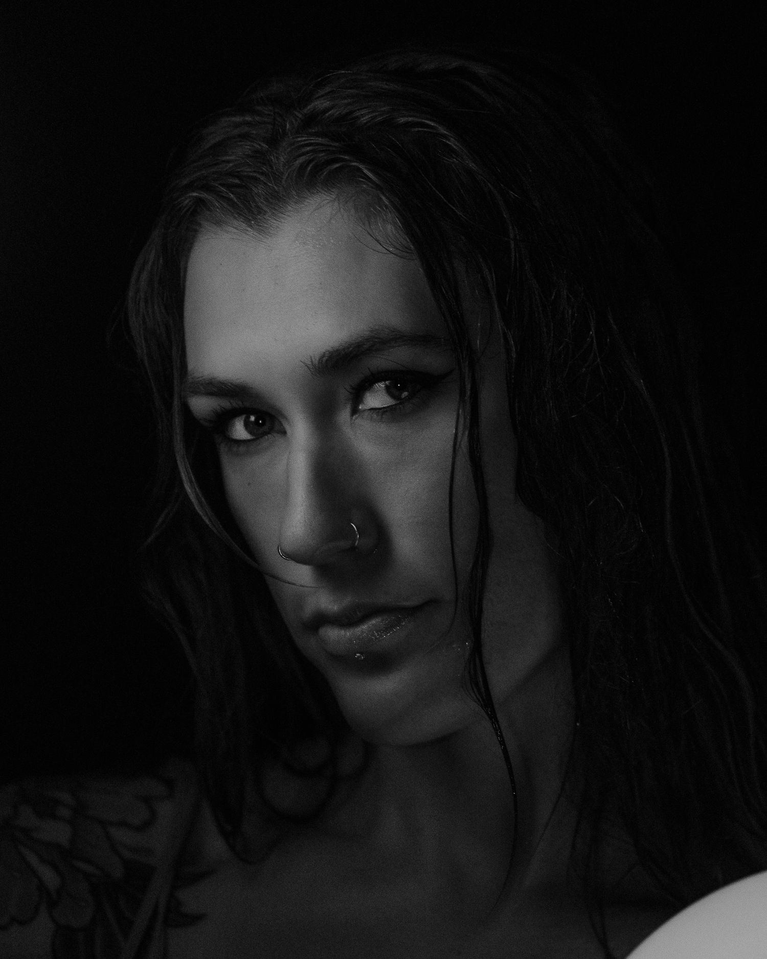 Portrait of a model posing in dramatic lighting