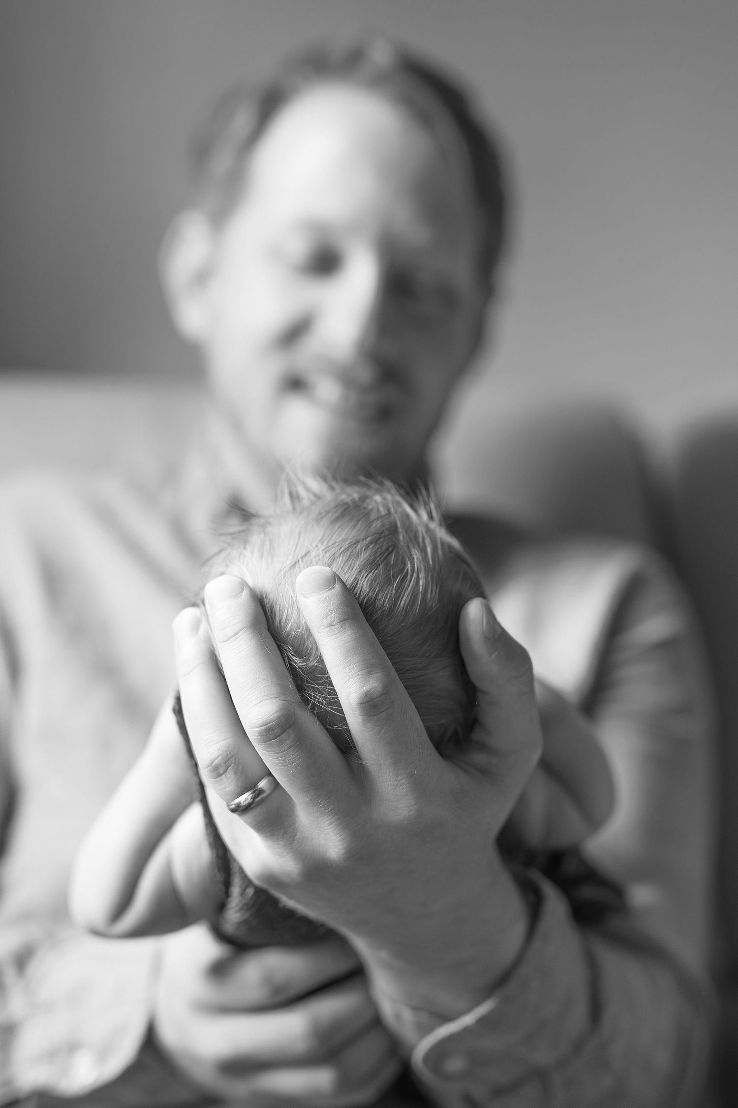Lifestyle in-home newborn session O'fallon, Illinois
