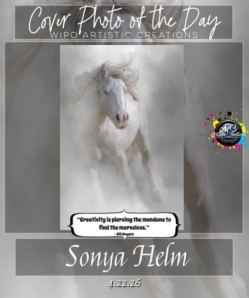 White horse galloping in ethereal mist, featured as WIPO Artistic Creations Cover Photo of the Day by Sonya Helm.