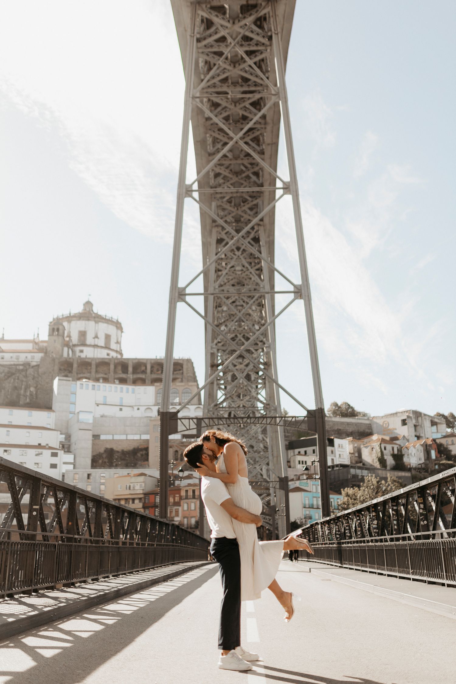 B&C embracing on iconic bridge of Dom Luis - Porto