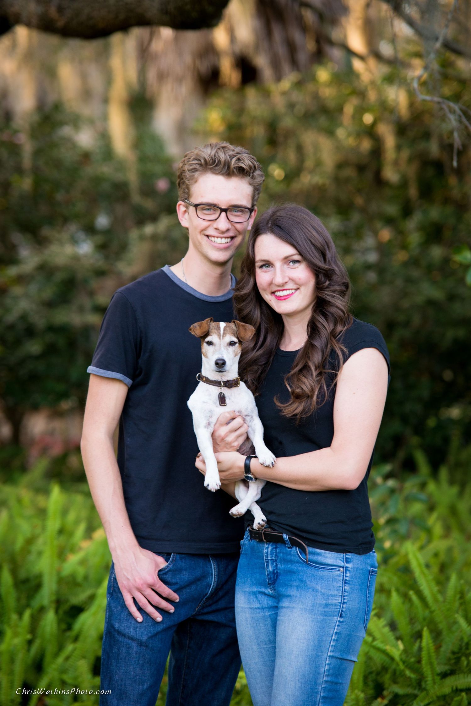 A couple holds their fur baby Lola during a portrait session near Gainesville, Fl.